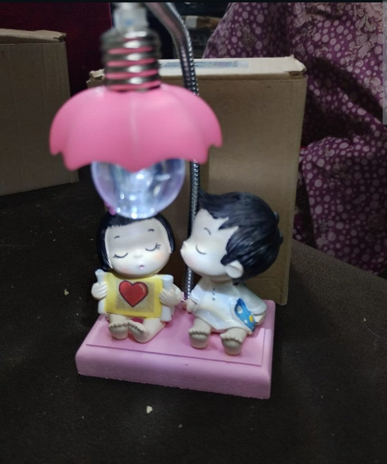 Happy couple With Lamp Gift